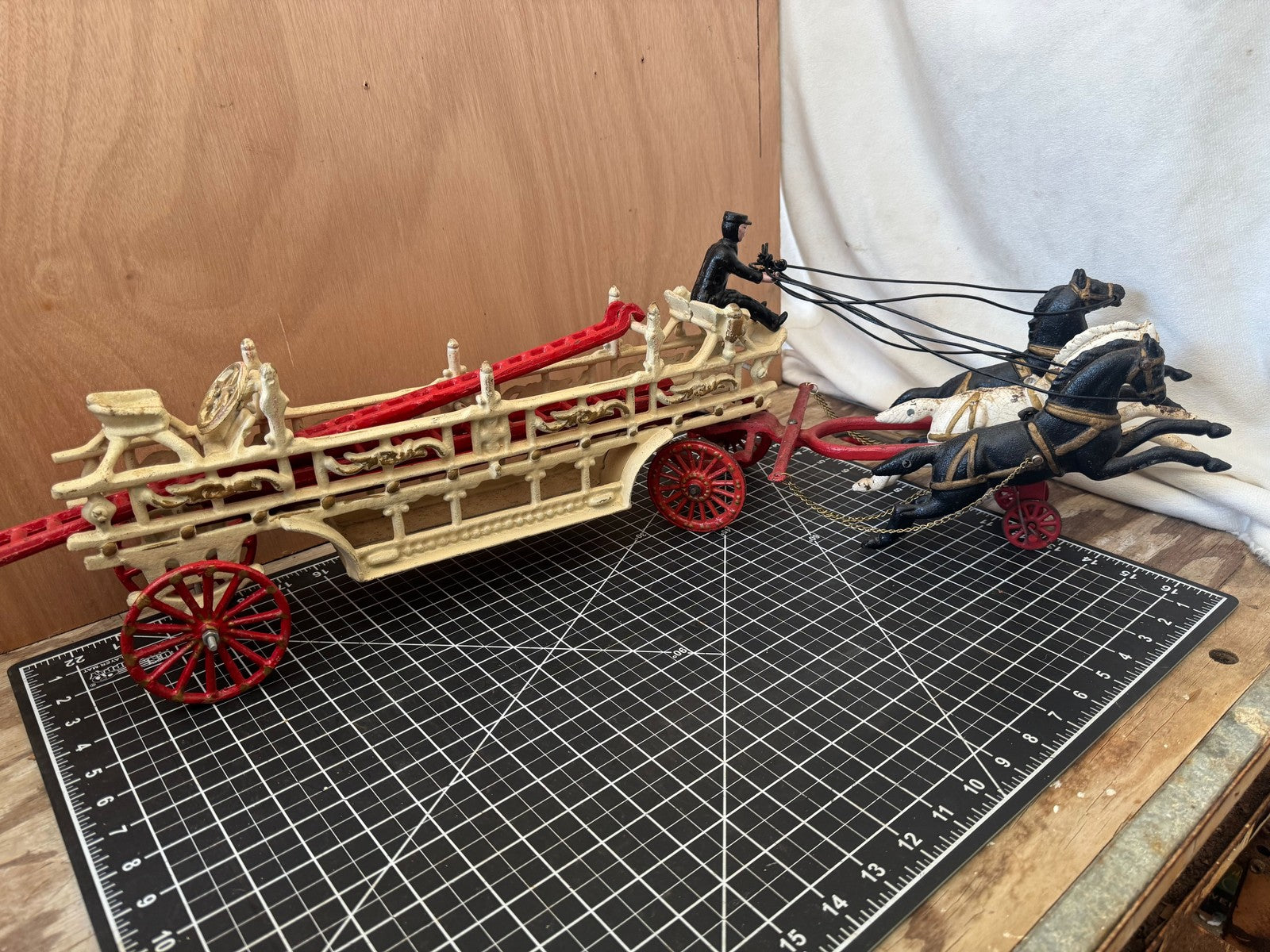 Vintage Cast Iron Hook & Ladder Fire Truck – 31” Long, 3 Horses, 3 Ladders
