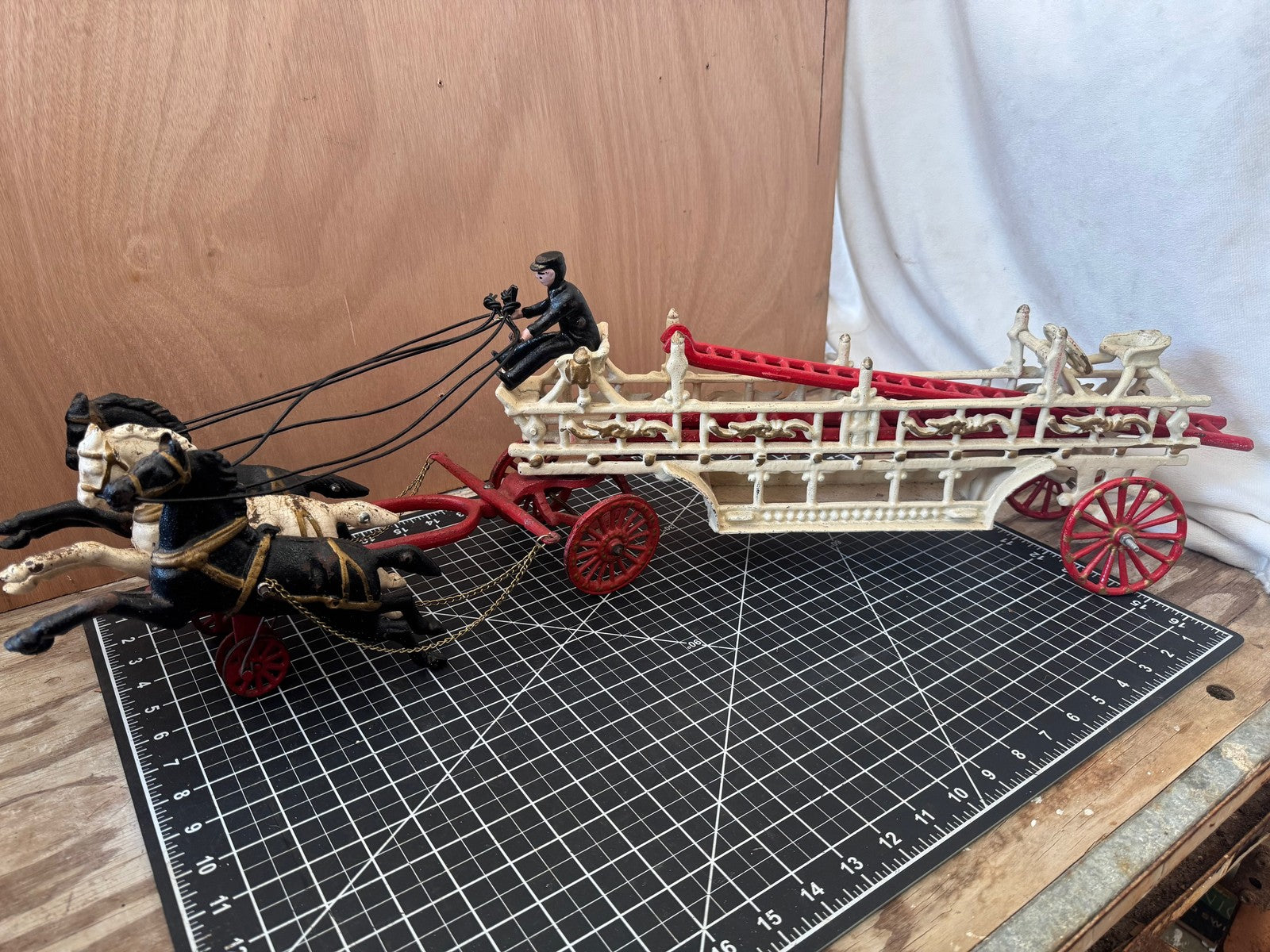 Vintage Cast Iron Hook & Ladder Fire Truck – 31” Long, 3 Horses, 3 Ladders